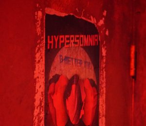 An in-world poster advertsing a ficitonal company called Hypersomnia